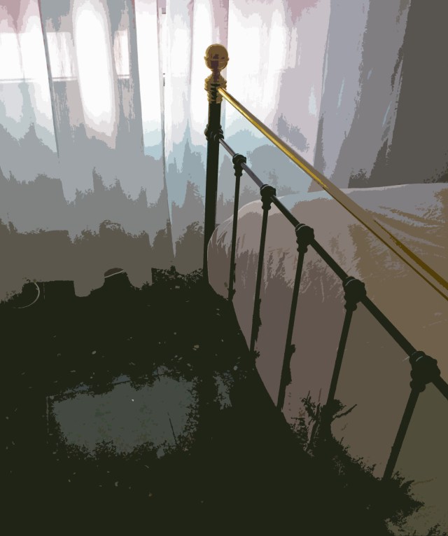 en el borde de la cama